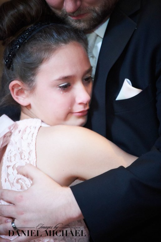 Cincinnati wedding photography capturing a natural and emotional dance between groom and daughter